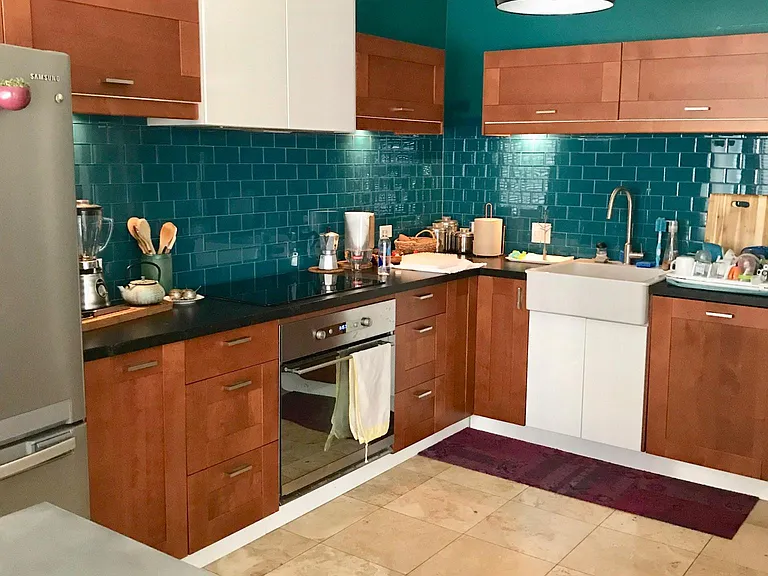 Custom designed kitchen; new stainless steel refrigerator and dishwasher
