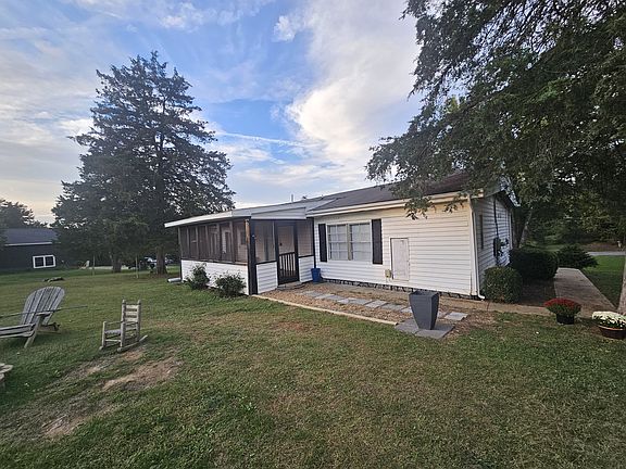 Back yard with screened in porch