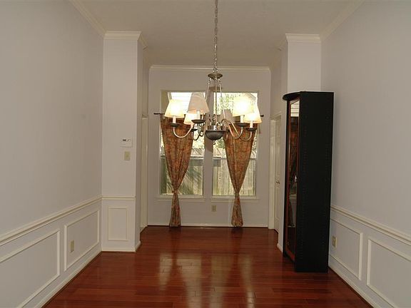 Gracious formal dining area for intimate dinner parties or festive family and holiday gatherings.