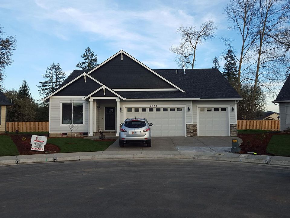 Front view of house on large lot.