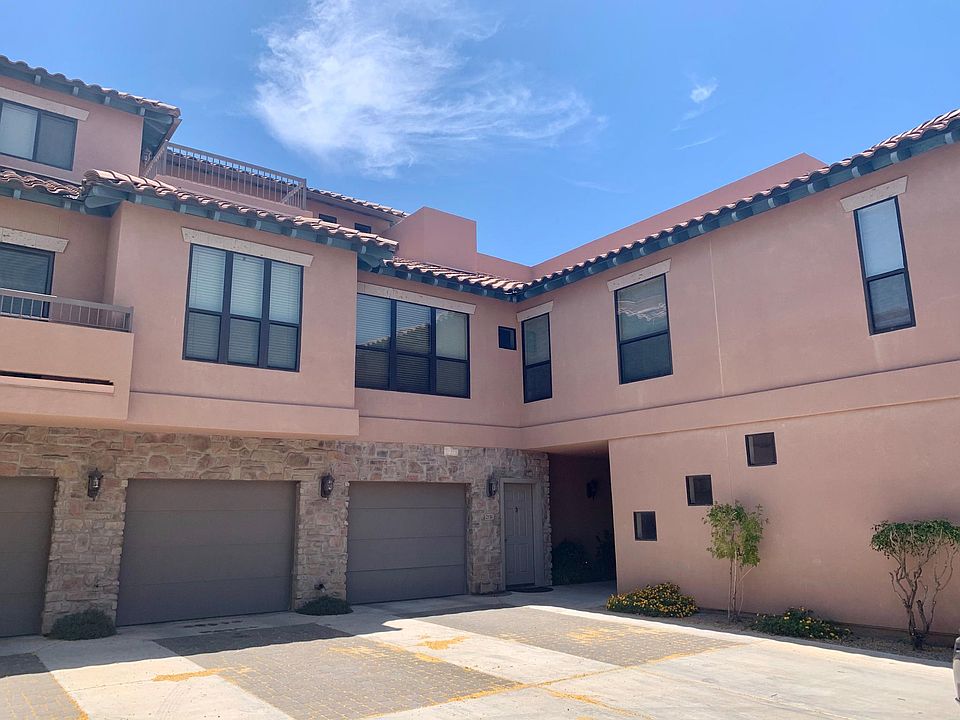 Tuscan exterior. Comes with two oversized garages plus driveway