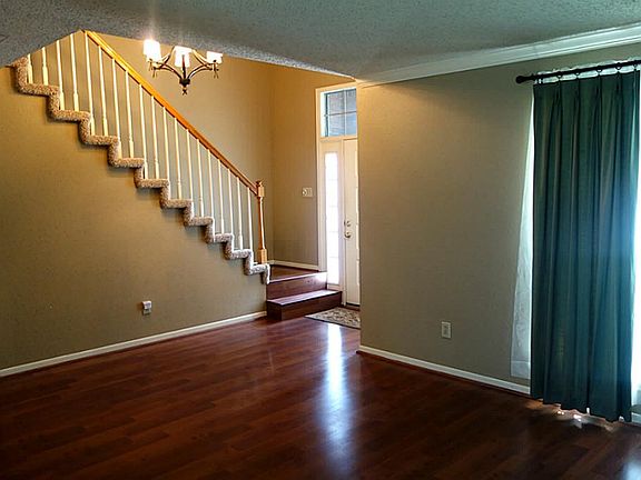 Beautiful Hardwood Floors grace this Entry