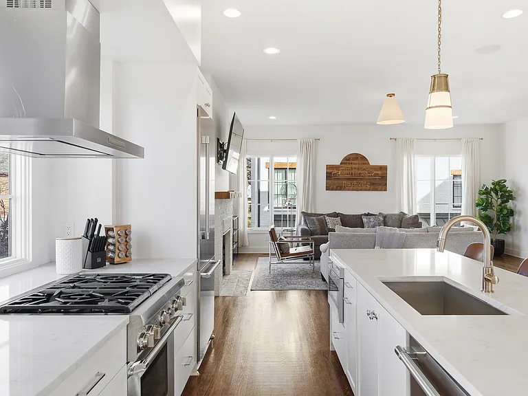 Fully equipped kitchen with stainless steel appliances, seating for 4 at the kitchen island, additional seating at the dining room table and all the dishware / utensils you might need.