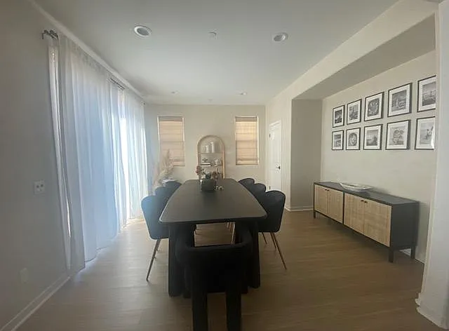 DINING ROOM OFF THE KITCHEN WITH SLIDING PATIO DOORS, LEADING TO HUGE BACKYARD
