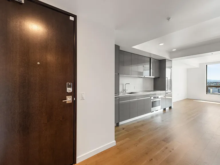 Enter the door and look at the left of the unit