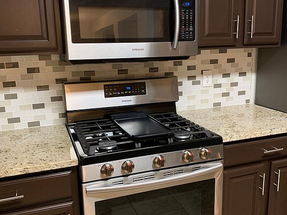 Samsung range and Samsung microwave.