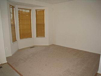 Carpeted living room,11 X 11, with bump out,
