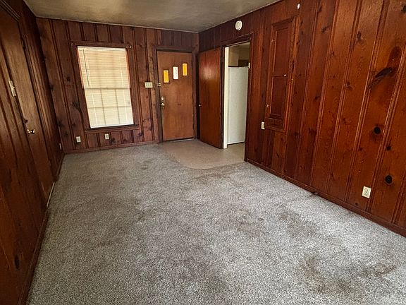 BACK DEN THAT CAN BE USED AS A 3RD BEDROOM