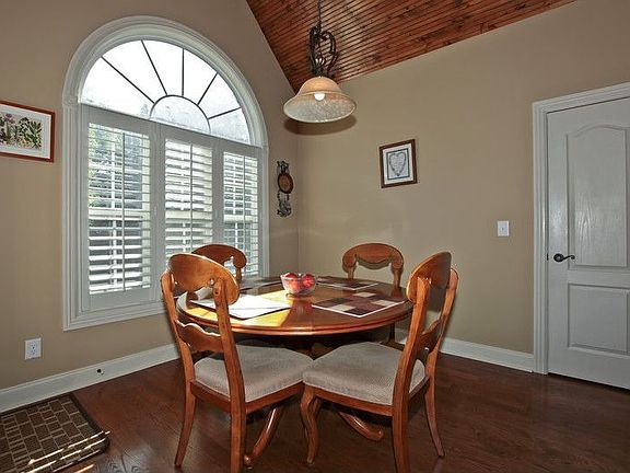 It Will Be Fun to Eat Here With the Wood Ceiling Detail and Beautiful Windows!