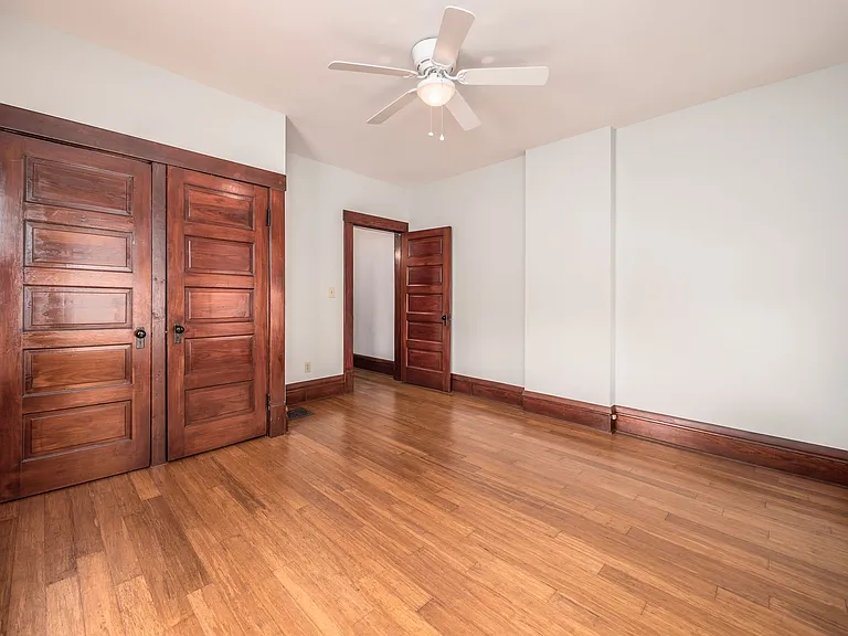 Generous closet space in bedroom with south and east facing windows. New ceiling fan installed 2025 (not pictured).
