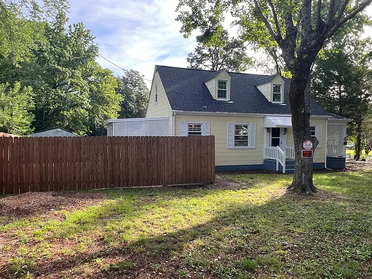 front of house... partially fenced