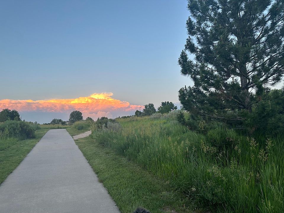 The path across the street at the park. You can walk or ride this paved path for miles and miles or take it to the mountain biking and hiking trail about 4 blocks away.