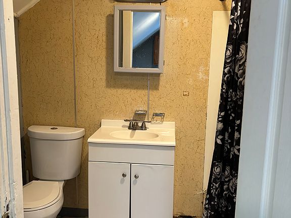 Bathroom off of kitchen