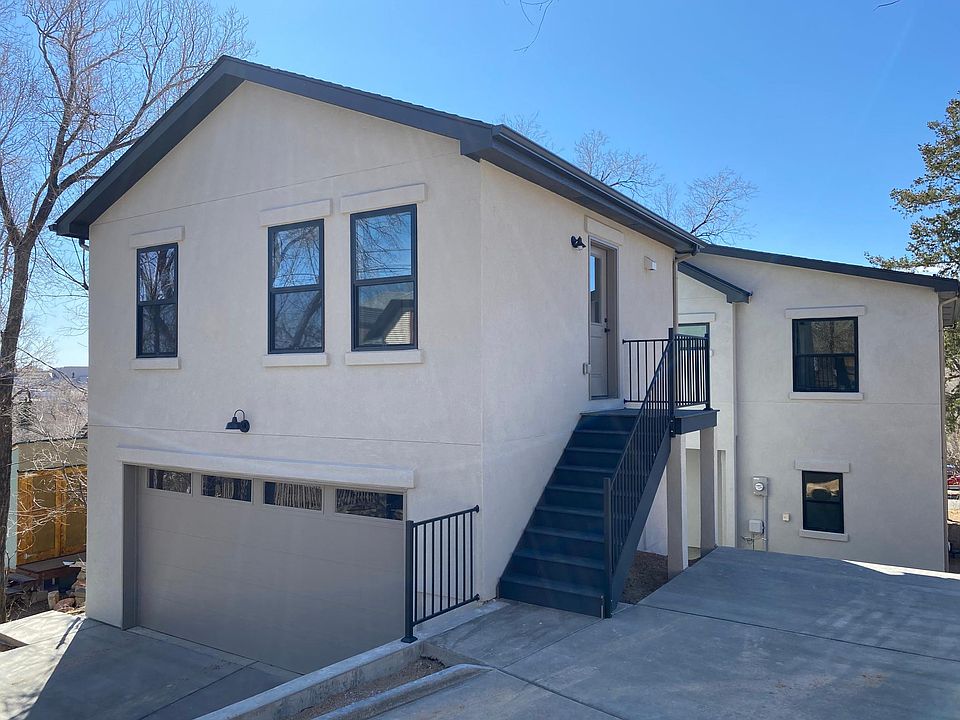 Entrance to apartment with adjacent, dedicated tenant parking pad