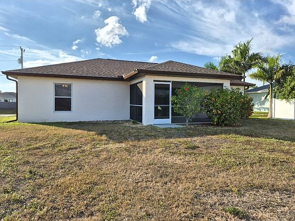 backyard and screen lanai