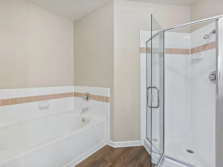 Well-appointed bathrooms are complete with ample storage