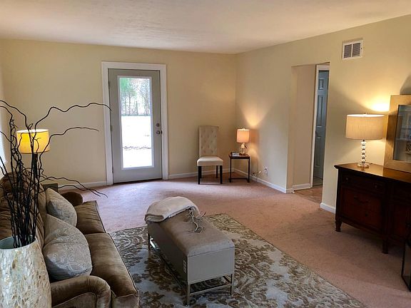 New Full light back door has been added to living room allowing a view of the expansive backyard and patio.