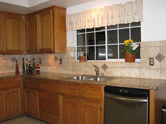 Kitchen's window overseeing Patio