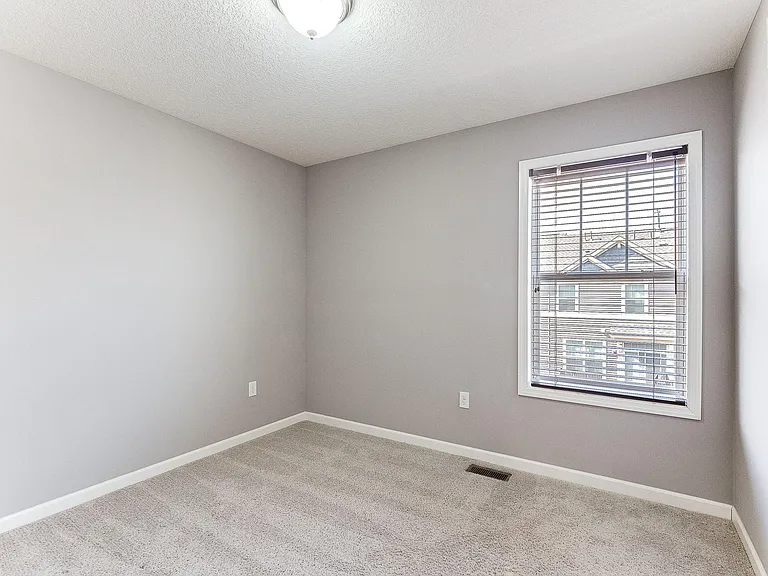 8974 SW Village Loop — Photo 15