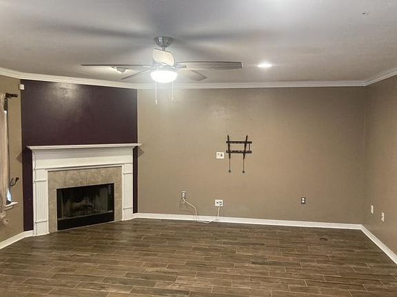 Living room with wood burning fireplace