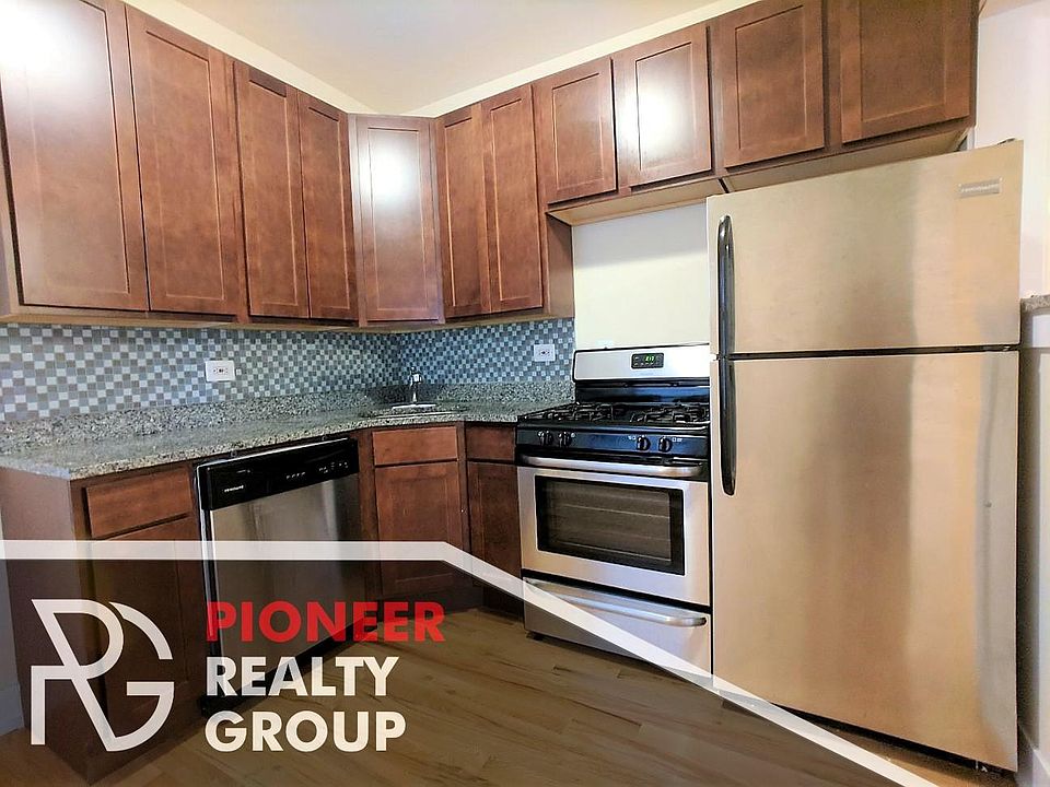 Renovated kitchen with nice finishes - backsplash, tall kitc