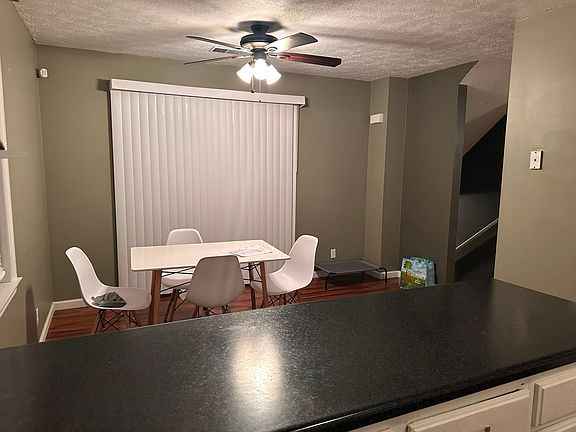 Dining area with door leading to 2nd level porch