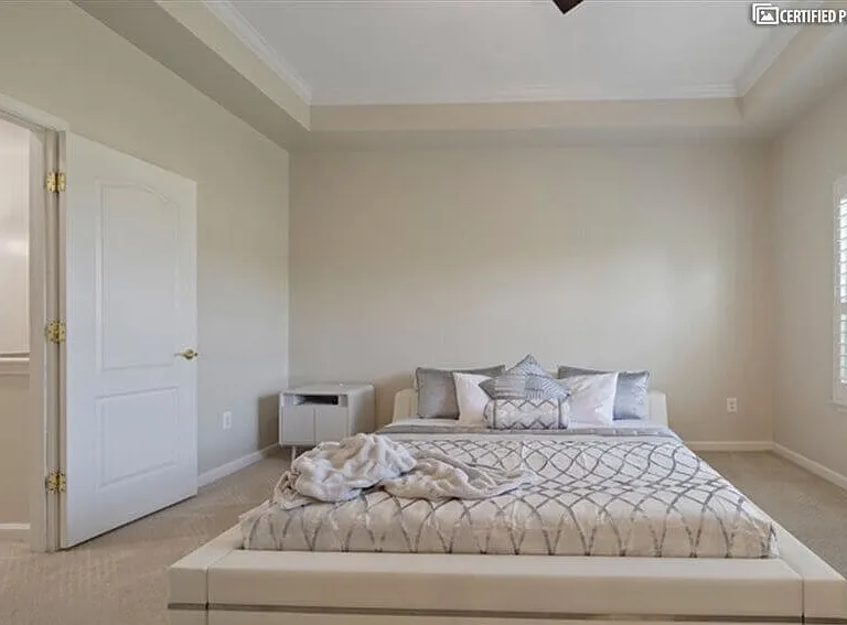 King bed with adjustable headrests and sleep number bed.