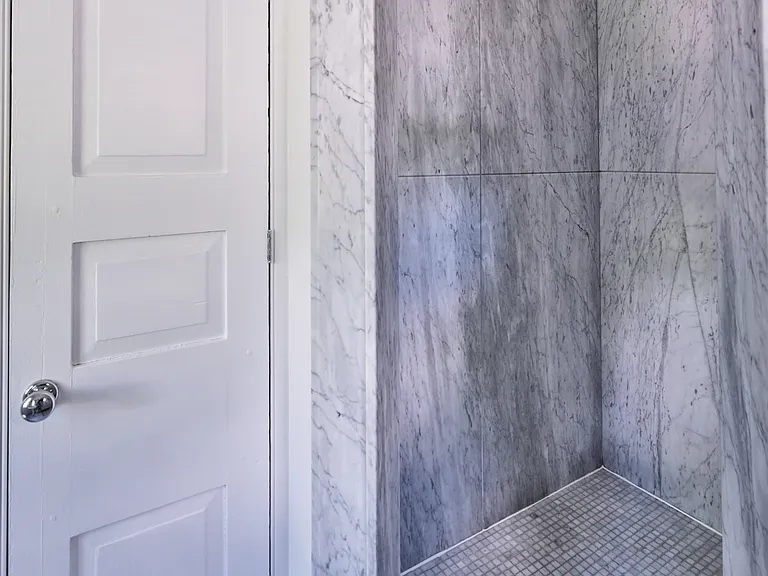Primary Suite - Bathroom Storage and Shower