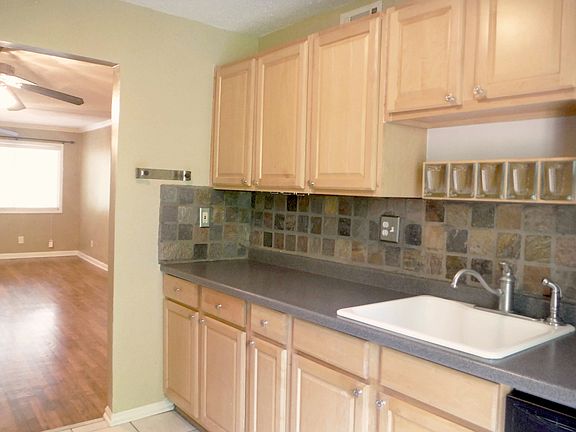 Gas range and side-by-side refrigerator