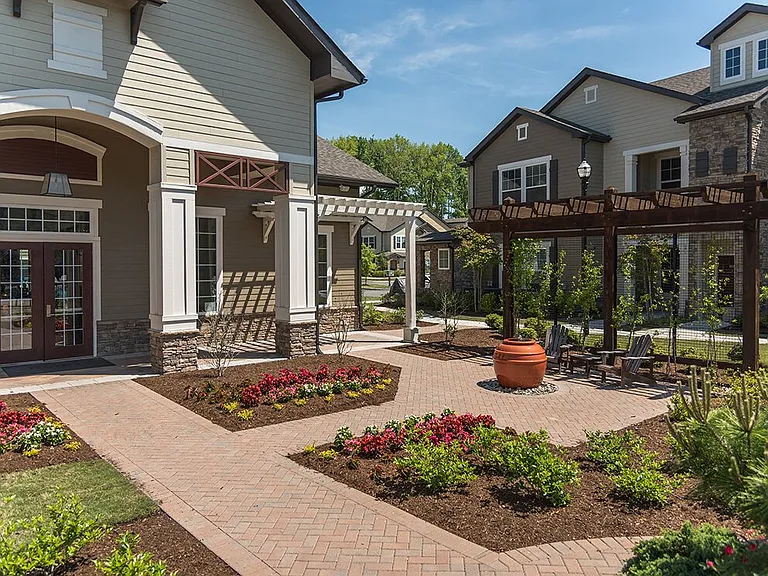 Lushly-Landscaped Courtyard with Pergola & Seating