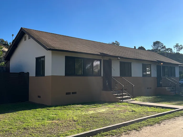 This is a duplex. The unit for rent is on the left.
