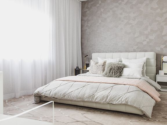 King sized bedroom with oversized window