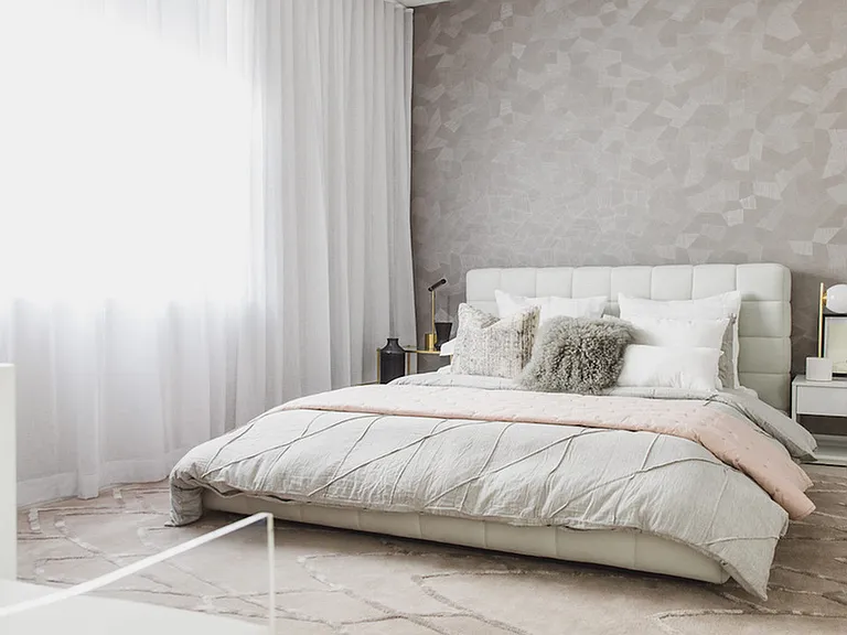 King sized bedroom with oversized window