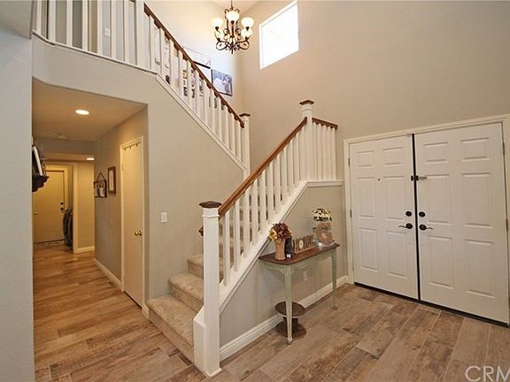 Double door entry under a high vaulted ceiling