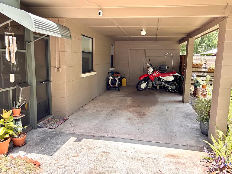 Large carport connected to house