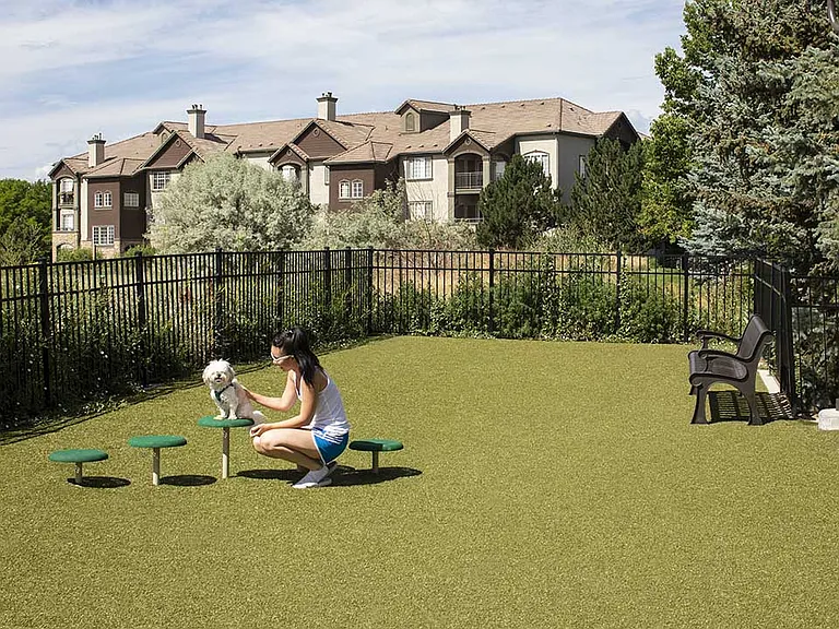 Apartment community off-leash dog park at Griffis Belleview Station in Denver, Colorado.