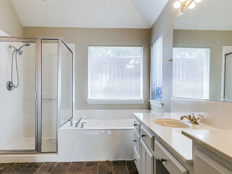 Jetted tub and shower with new door & enclosure.