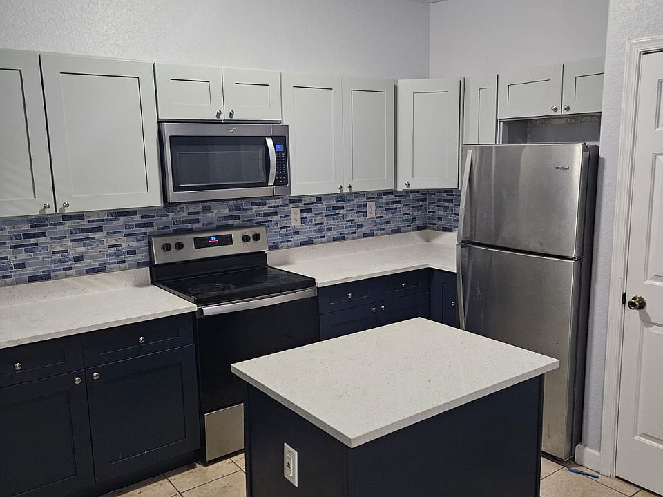 Fully renovated Kitchen with Brand New Cabinets/Countertops and Stainless Steel Appliances