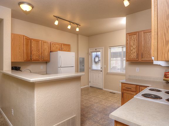 KITCHEN/BACK ENTRANCE.