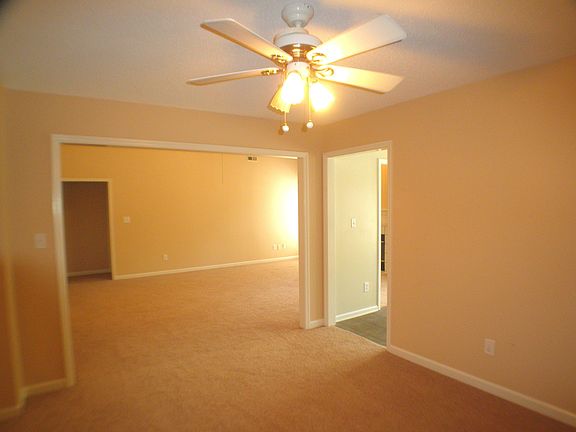 Dining room with new paint and new carpet.