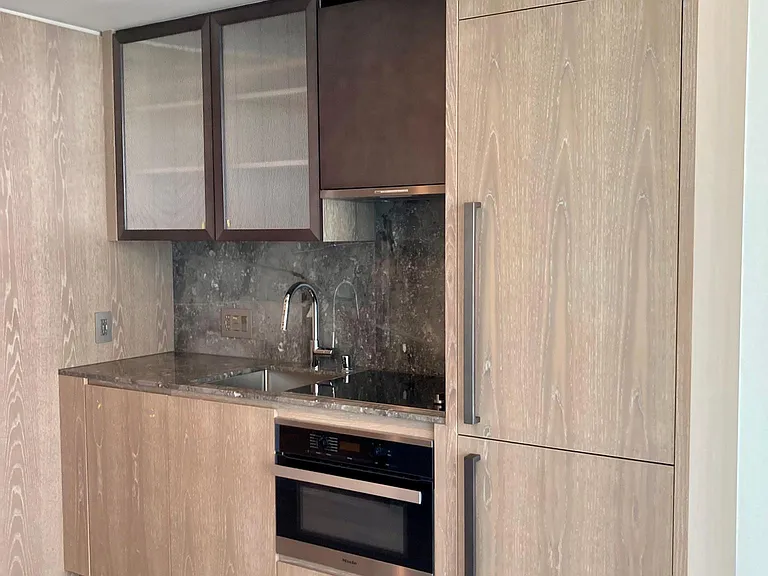 Beautiful kitchen with Miele appliances.
