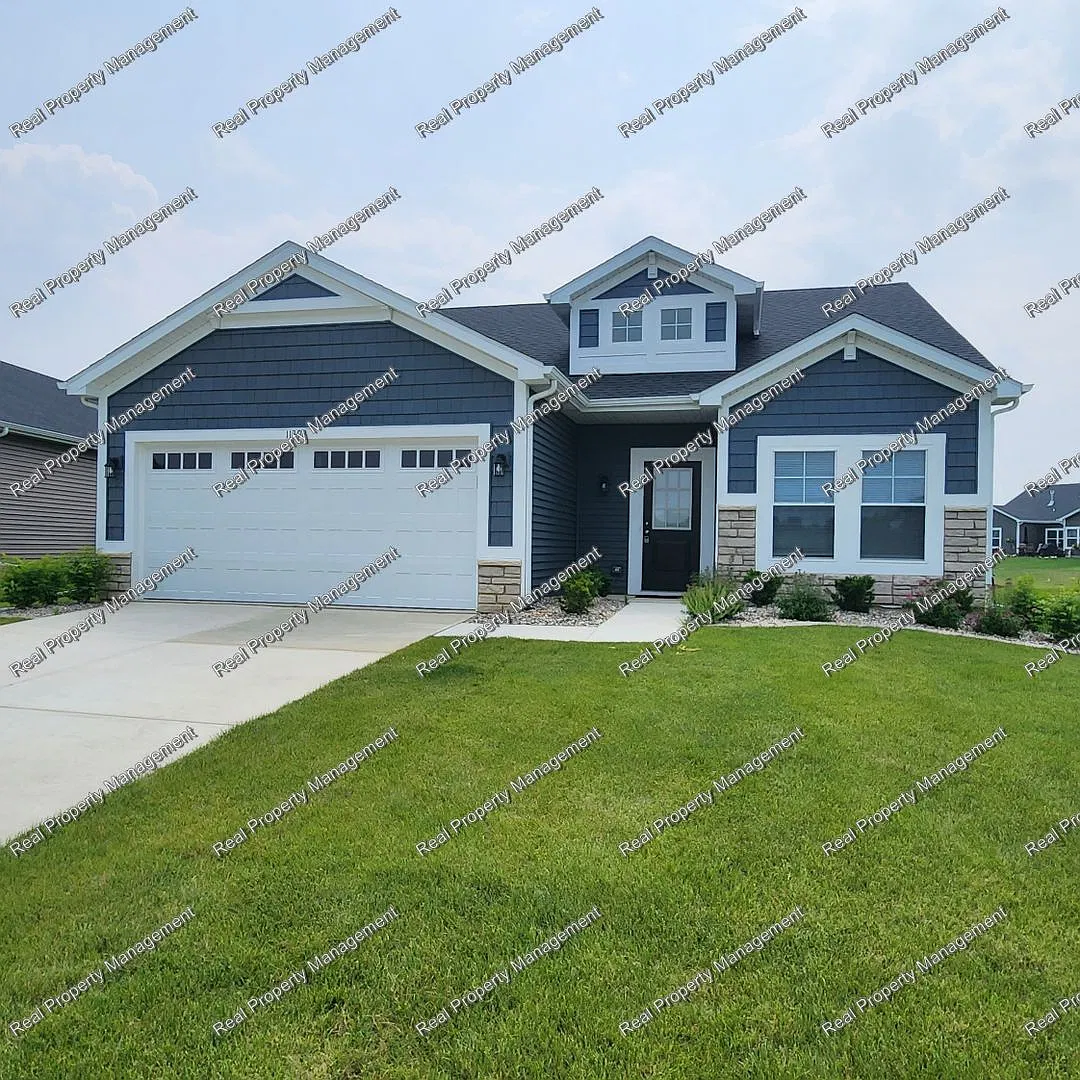 Maintenance Free 2 Bedroom Home — Photo 1
