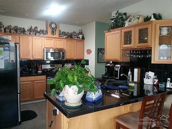 5th image of 4227 SW Tommy Armour Ln