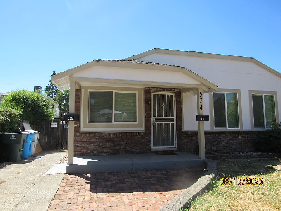Front of house with driveway
