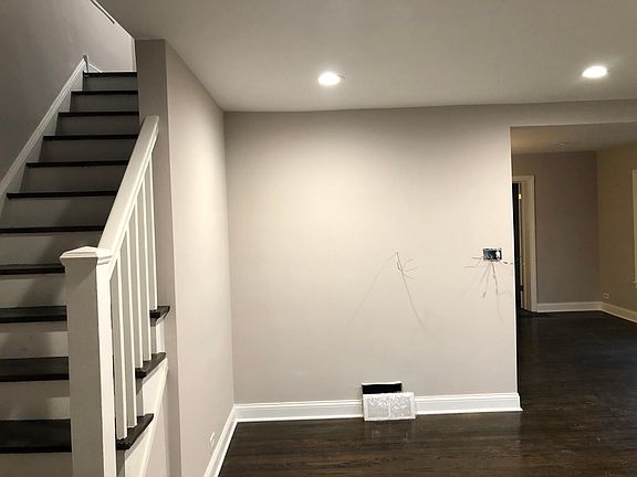 Stairs and front corner to LR, and dining room to back right