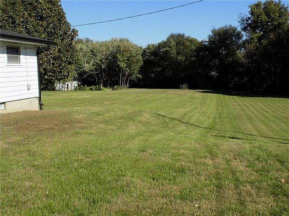 Large back yard - goes all the way to the tree line.