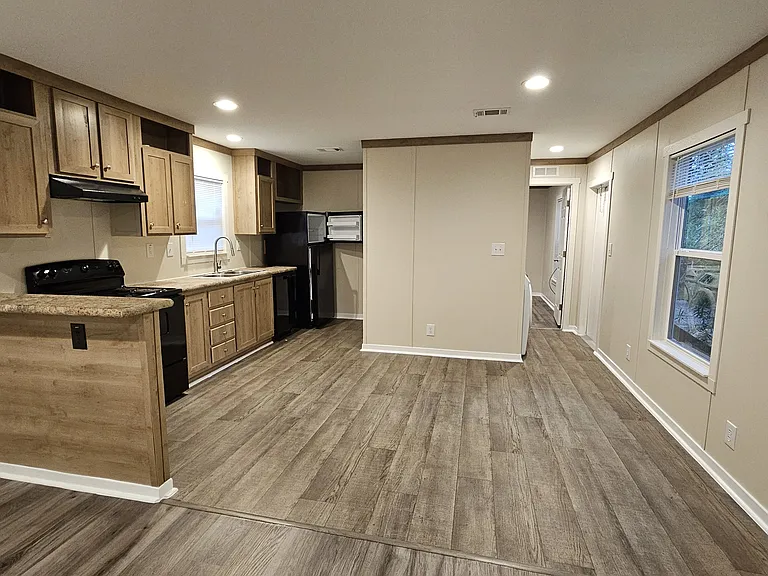 Dining area and kitchen. Refrigerator,Dishwasher ,and Stove are all included for your convenience.