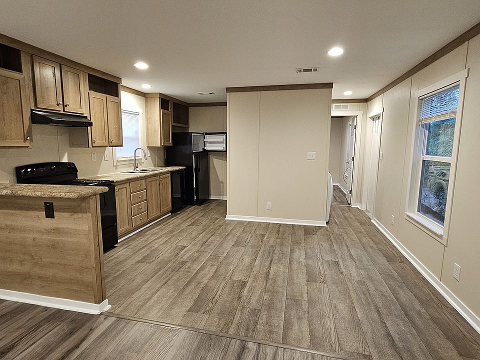 Dining area and kitchen. Refrigerator,Dishwasher ,and Stove are all included for your convenience.