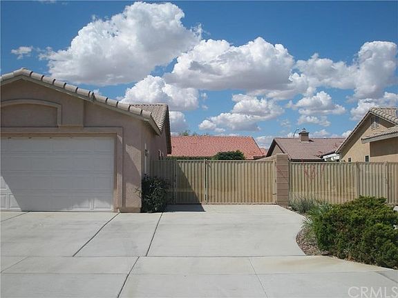 Gated RV parking with cement on right side