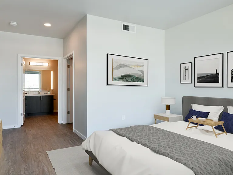 Bedroom with private bathroom and oversized closet